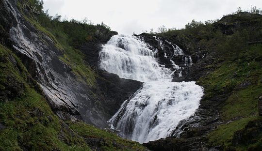 A beautiful scenery of the Kjosfossen Waterfall in Myrdal, Norway